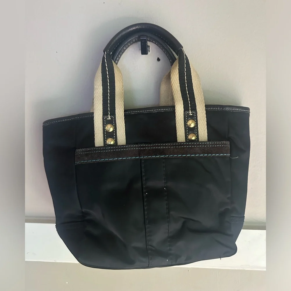 Coach Black Tote with Cream Canvas Handles and Teal Charm